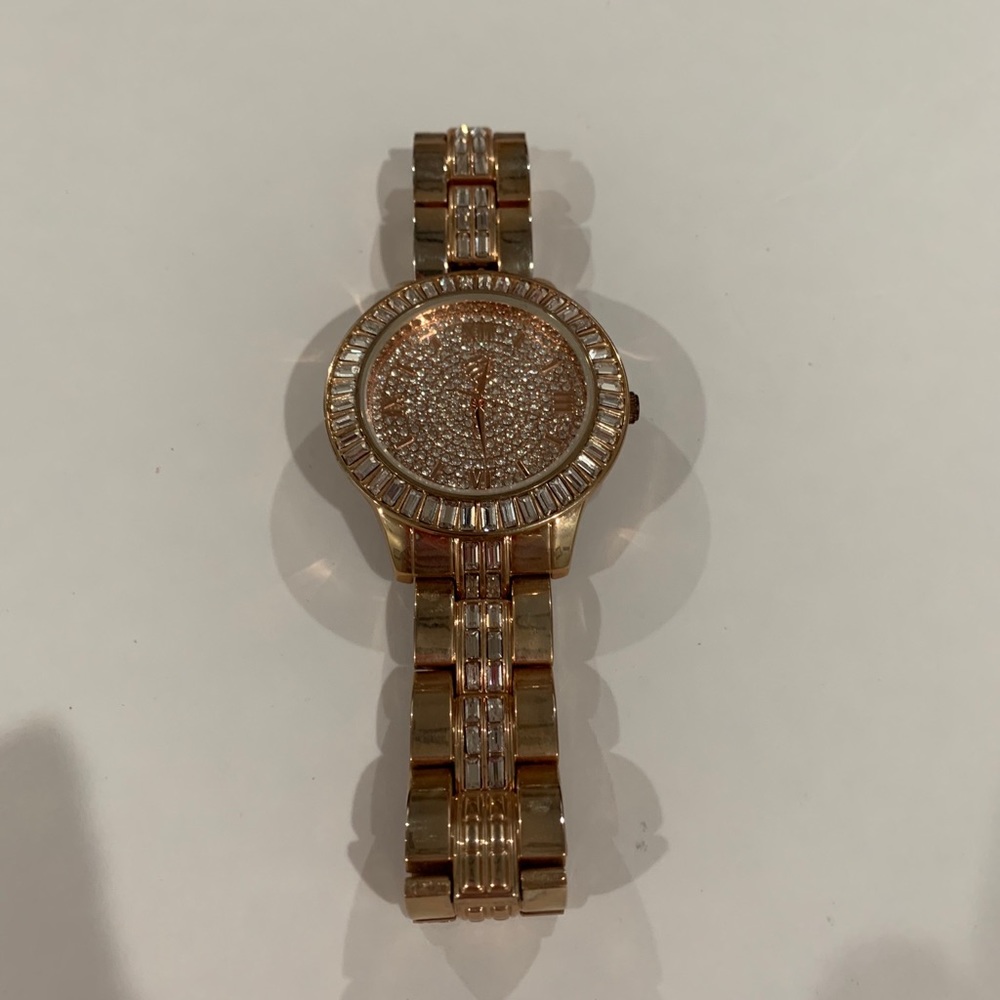 Rhinestone gold tone watch. Needs battery.